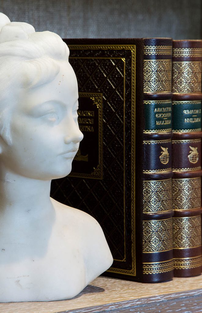 Library vignette, leather bound books, marble bust, Kent country house