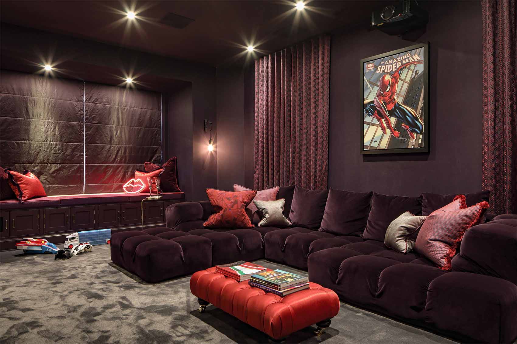Purple home cinema, aubergine wall paper, velvet L shape sofa, silk carpet, Cotswold retreat, Rene Dekker
