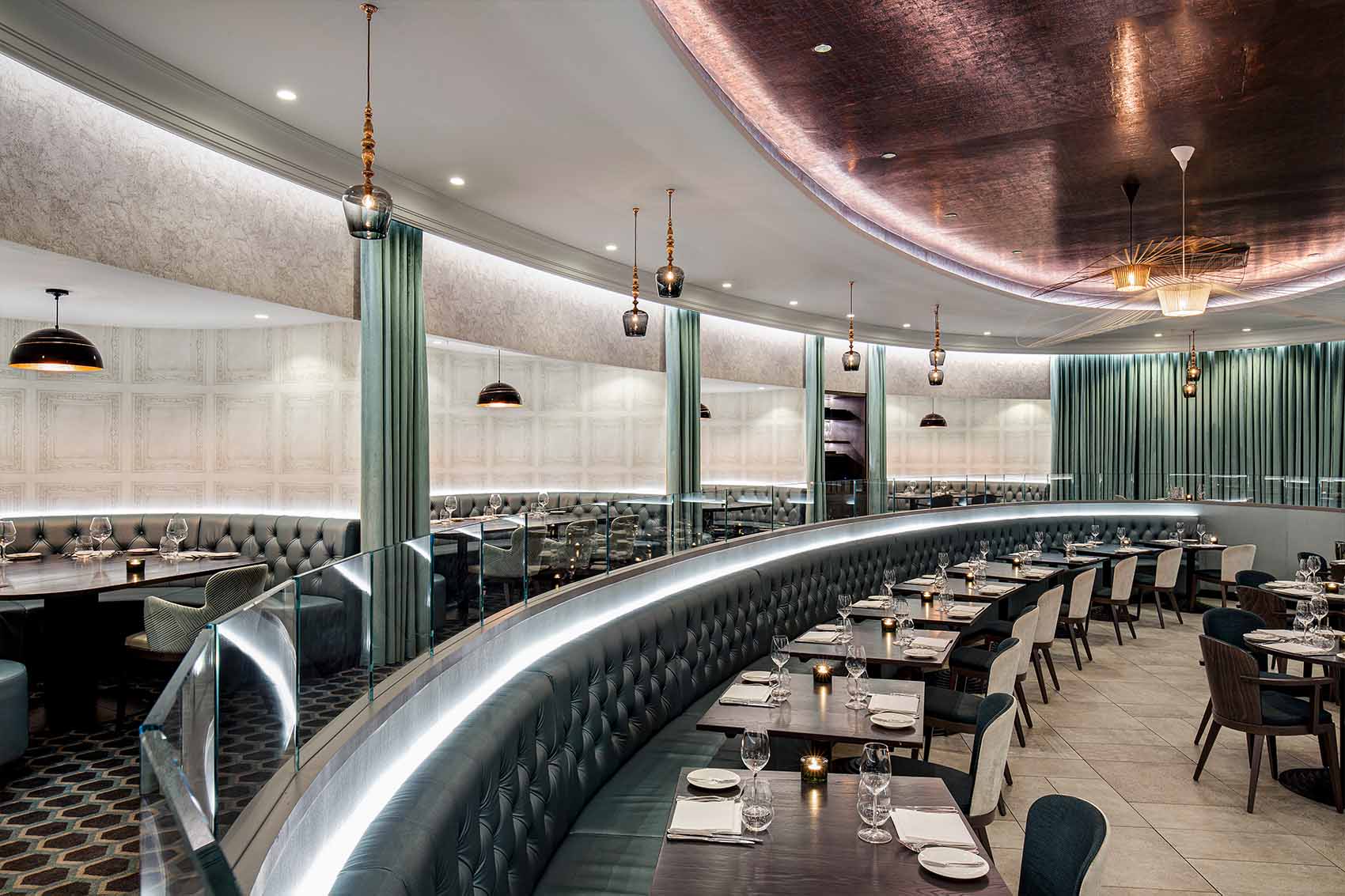 Oval restaurant, top London Interior designer, white and mint scheme, velvet banquette