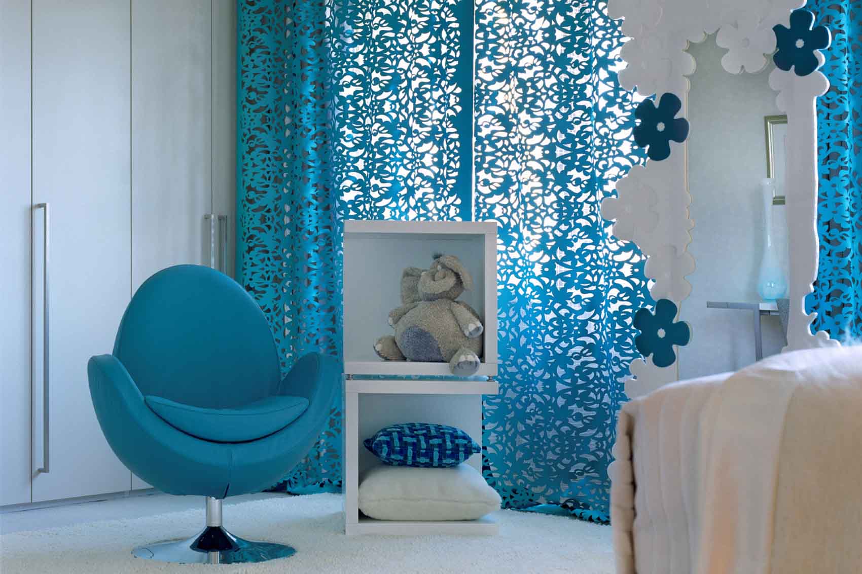 Turquoise kids bedroom, filigree turquoise curtains, cashmere throw, Perspex bedside tables